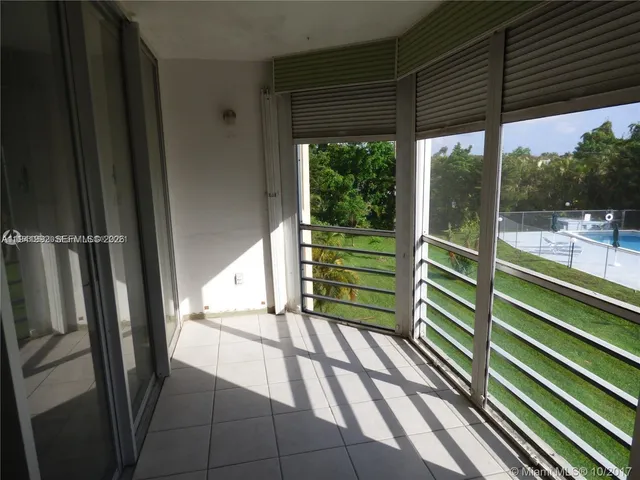 a view of outdoor space with deck and furniture