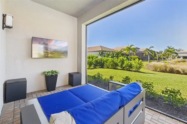 a view of a living room and furniture