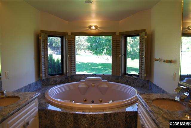 2570 Spinnaker Drive Reno, NV 89519 - Photo 6 of 9 a view of a house with a swimming pool