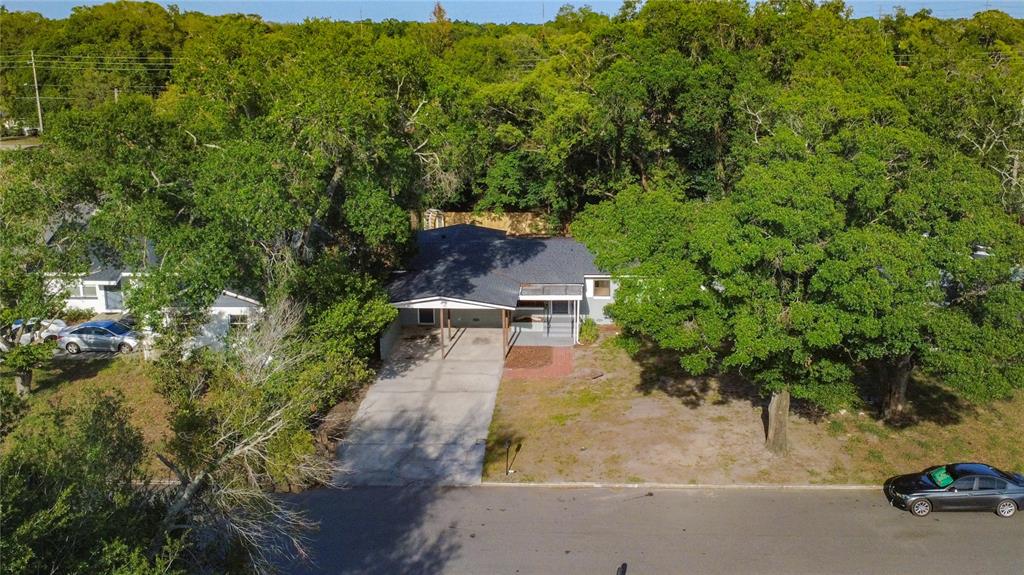 2105 Shaffer Place Orlando, FL 32806 - Photo 13 of 68 an aerial view of a house with yard and green space