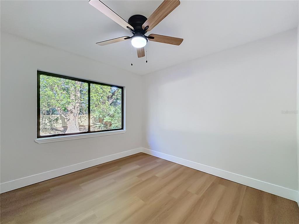 2105 Shaffer Place Orlando, FL 32806 - Photo 44 of 68 an empty room with a window