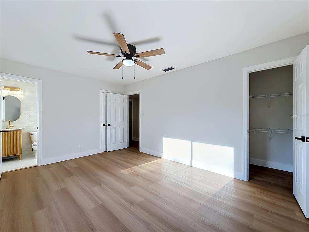 2105 Shaffer Place Orlando, FL 32806 - Photo 51 of 68 a view of empty room with wooden floor