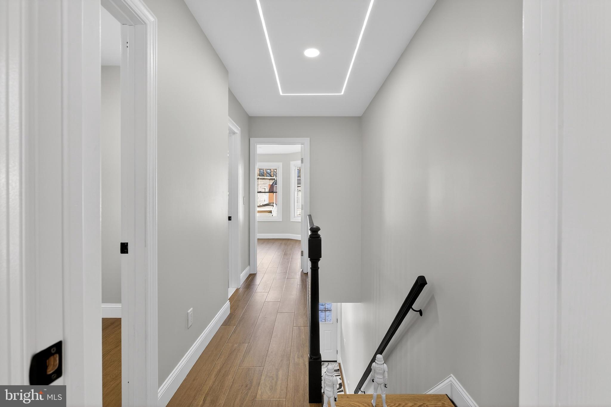 3450 Hurley Street Philadelphia, PA 19134 - Photo 22 of 31 a view of a hallway with wooden floor and stairs