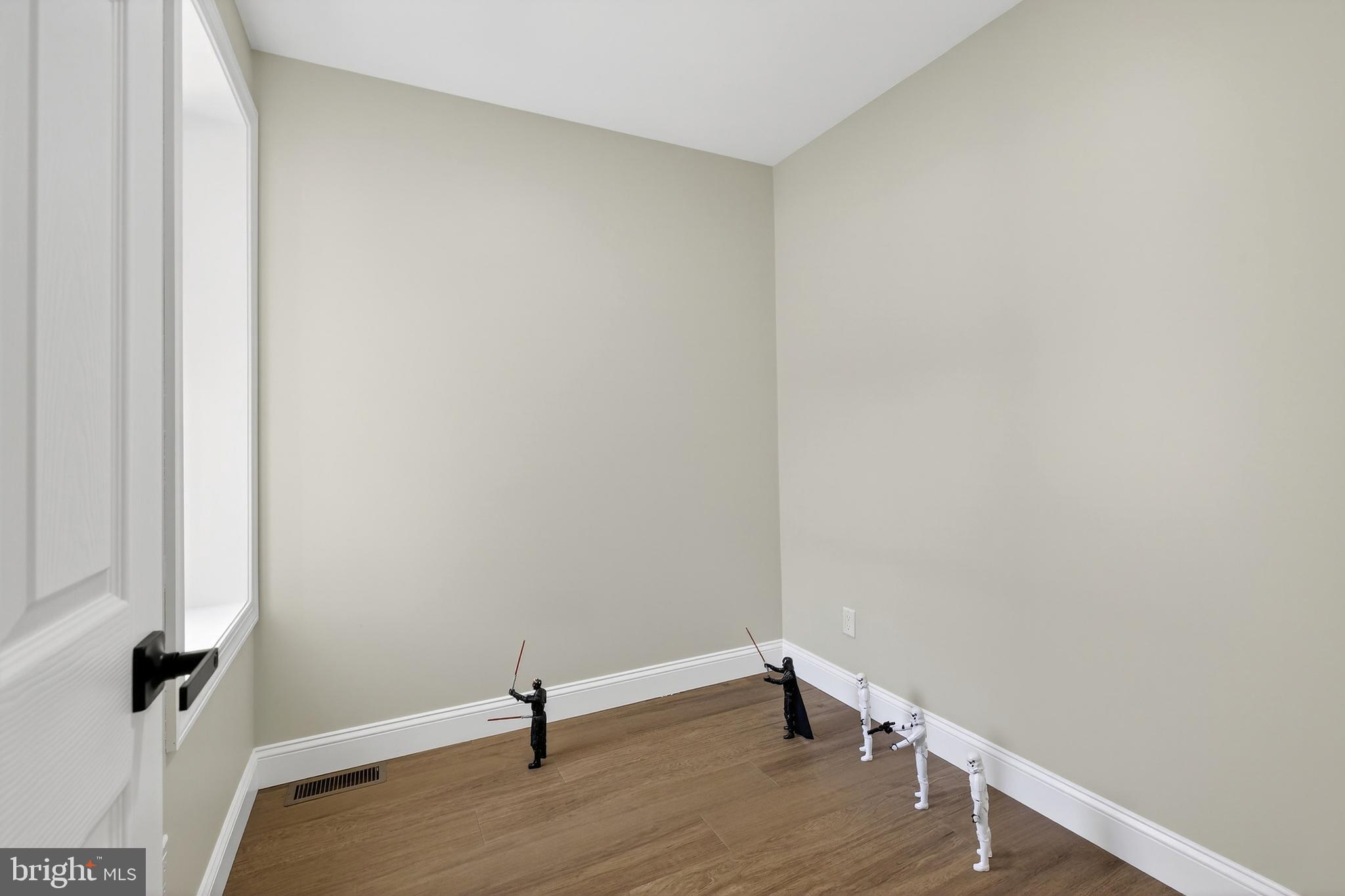 3450 Hurley Street Philadelphia, PA 19134 - Photo 23 of 31 a view of a small space with wooden floor and a window