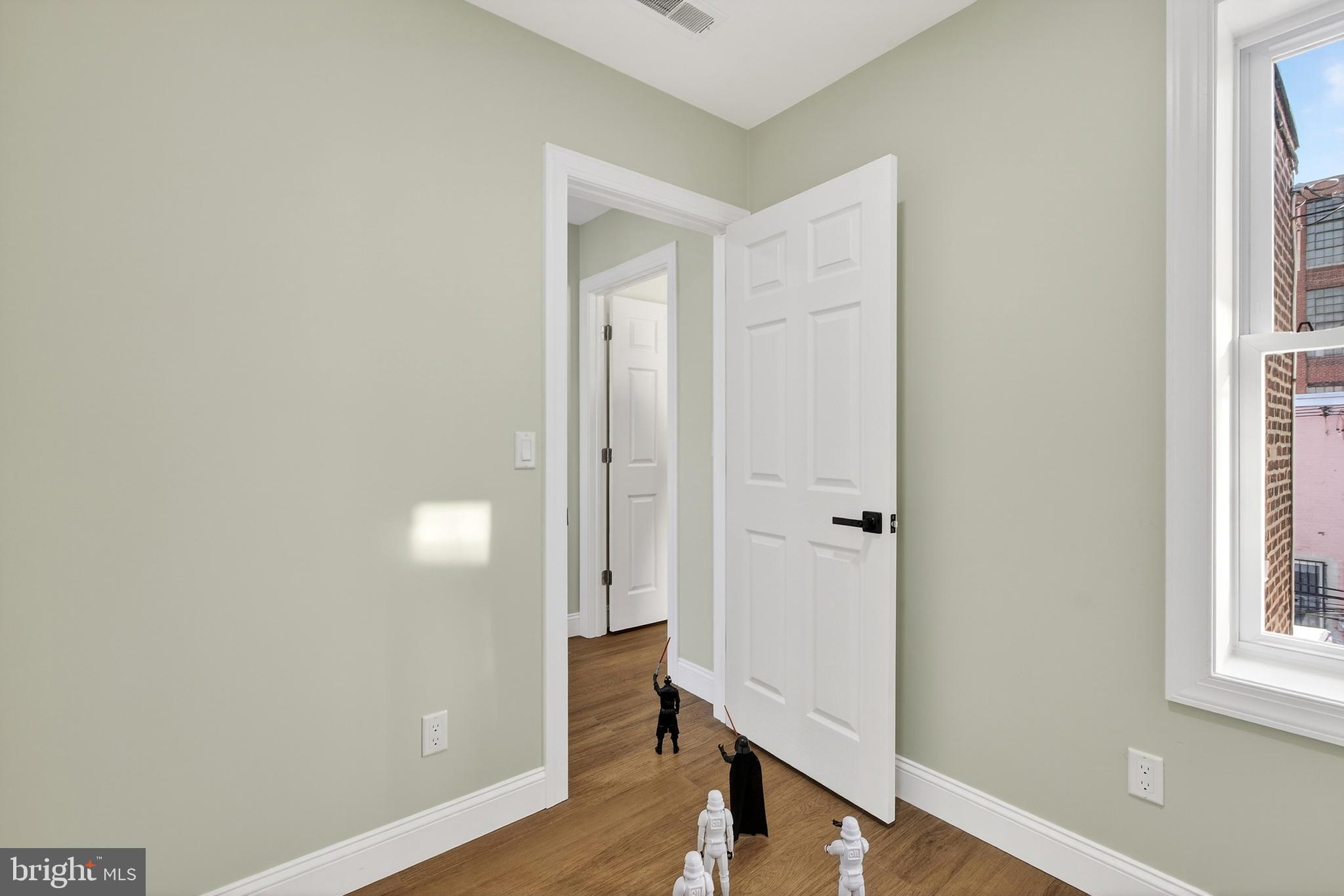 3450 Hurley Street Philadelphia, PA 19134 - Photo 24 of 31 a view of a room with wooden floor and a bathroom