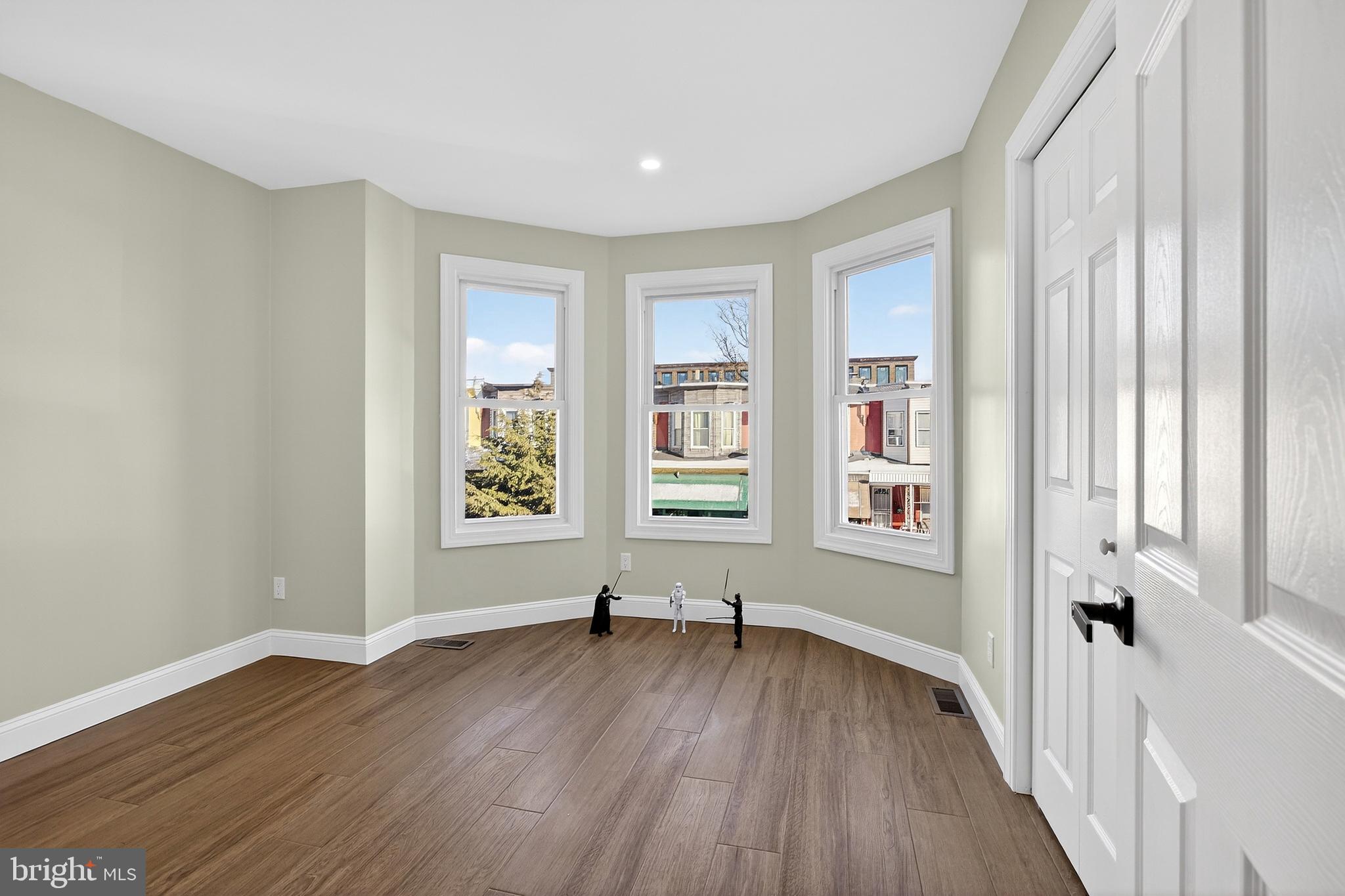 3450 Hurley Street Philadelphia, PA 19134 - Photo 27 of 31 wooden floor in an empty room with a window