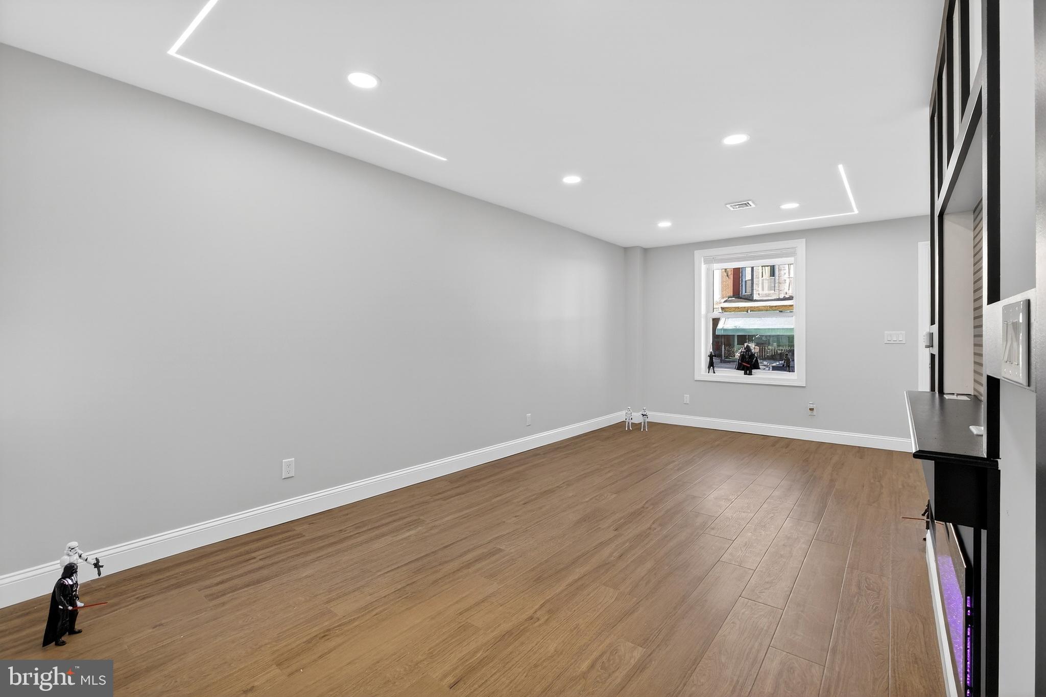 3450 Hurley Street Philadelphia, PA 19134 - Photo 30 of 31 an empty room with wooden floor and a window