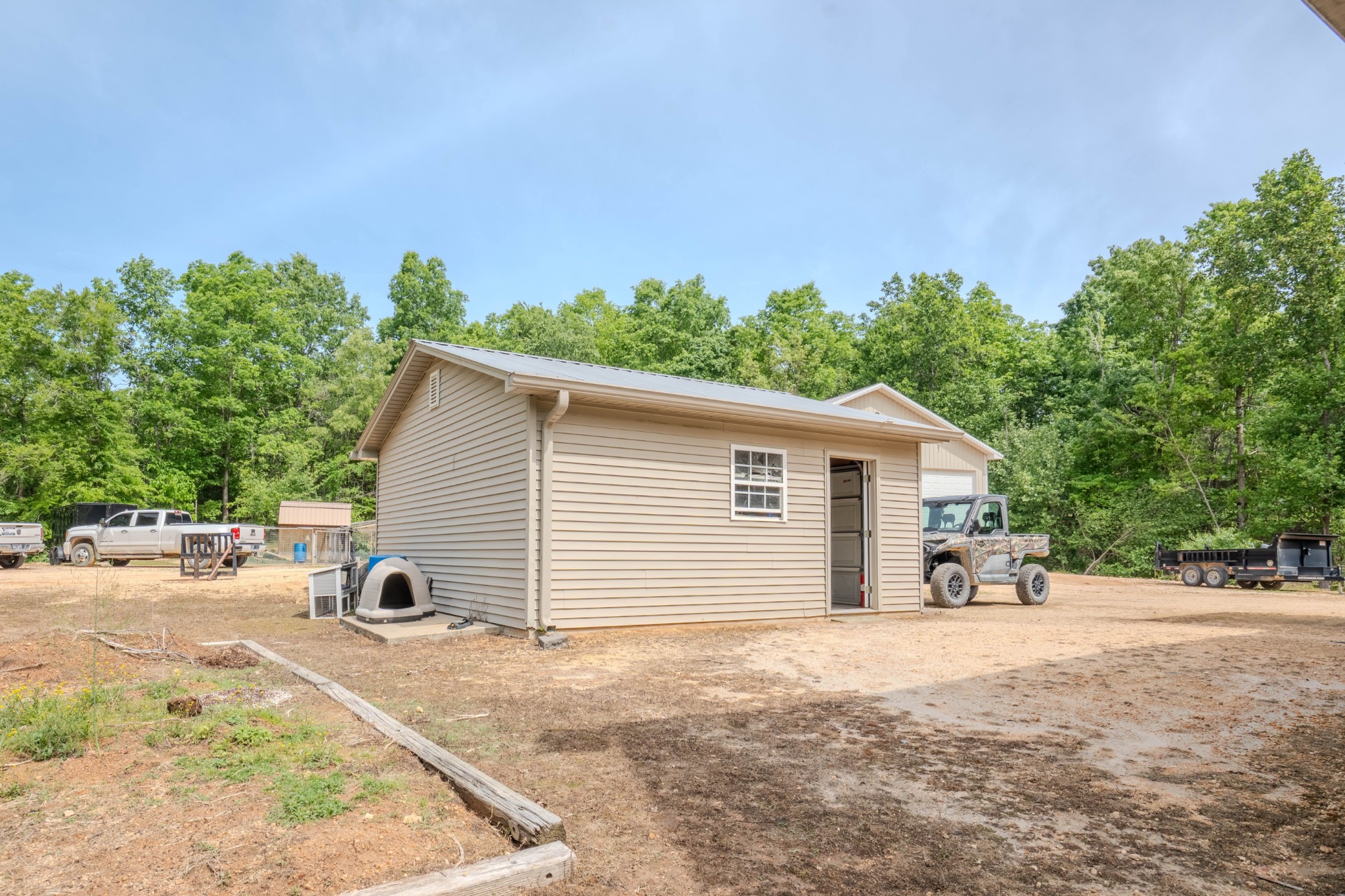 1211 Bundrant Branch Road Waynesboro, TN 38485 - Photo 45 of 74 a view of a backyard with a garden and mountain view