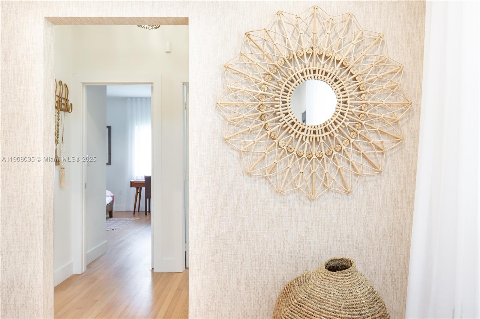 501 Southwest 19th Road Miami, FL 33129 - Photo 37 of 59 a bedroom with a bed and wooden floor