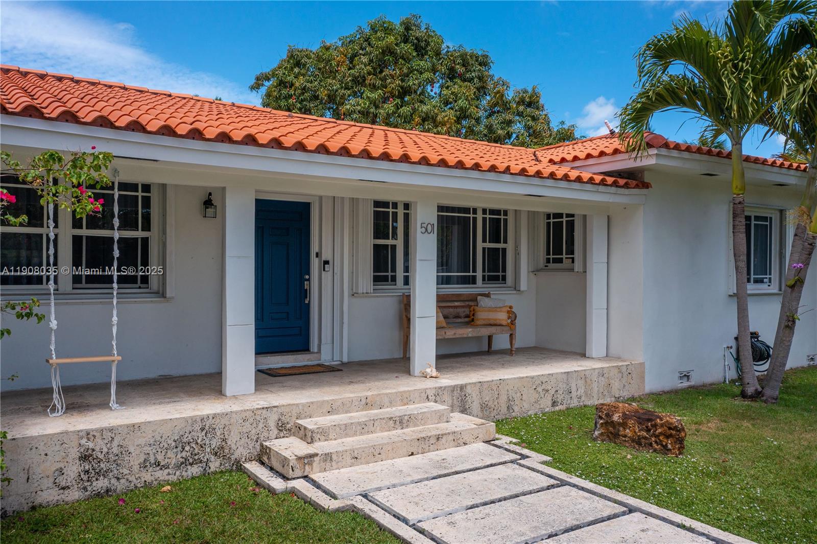 501 Southwest 19th Road Miami, FL 33129 - Photo 50 of 59 a view of a house with many windows and plants