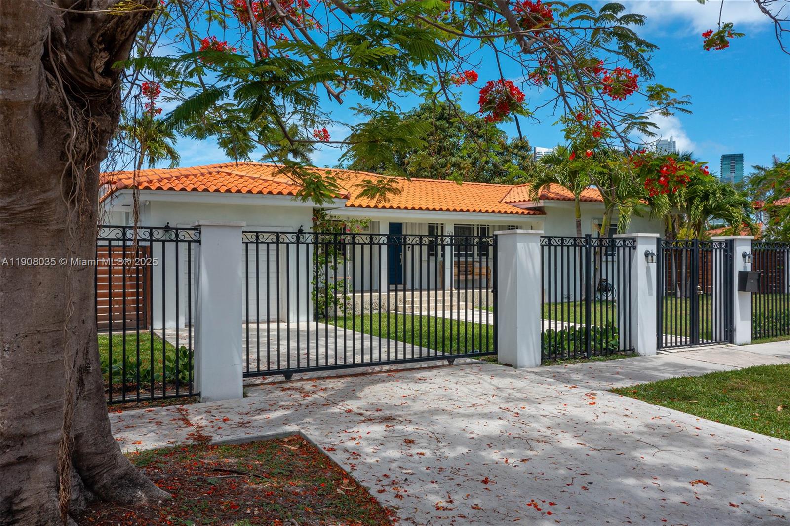 501 Southwest 19th Road Miami, FL 33129 - Photo 55 of 59 a front view of a house with a garden