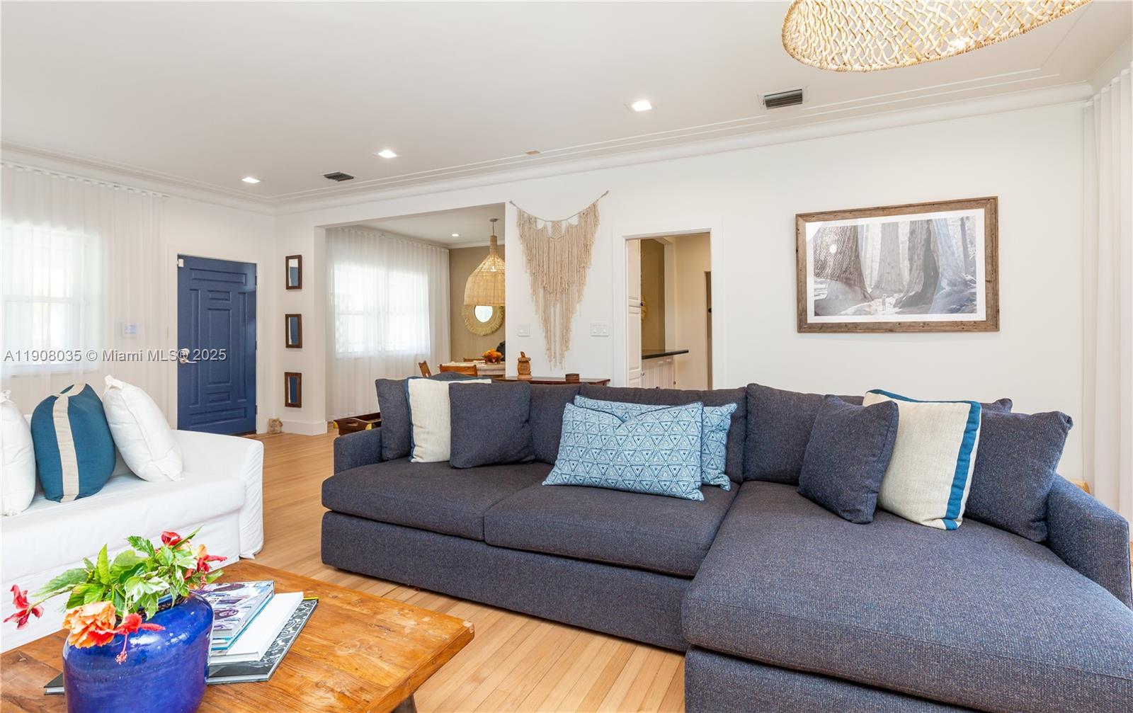 501 Southwest 19th Road Miami, FL 33129 - Photo 7 of 59 a living room with furniture and flowers