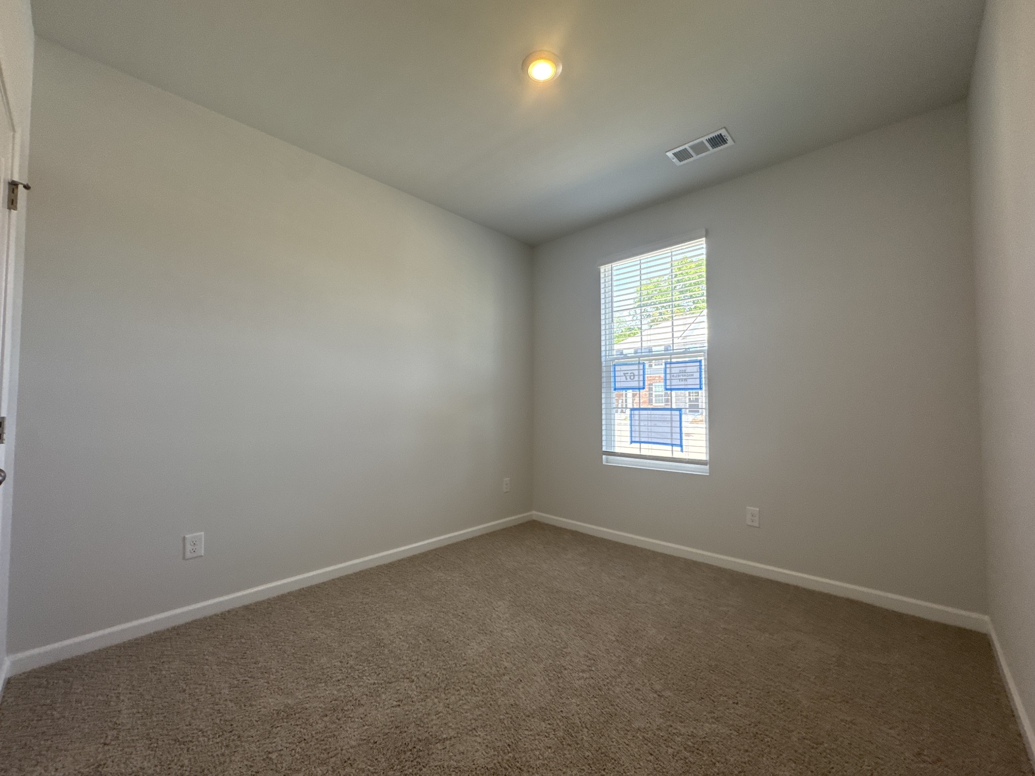 905 Highfield Way Lebanon, TN 37087 - Photo 3 of 15 an empty room with a window