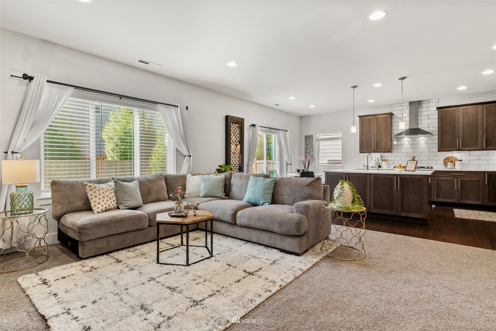 3720 194th Place Southeast Bothell, WA 98012 - Photo 11 of 36 a living room with furniture and a large window
