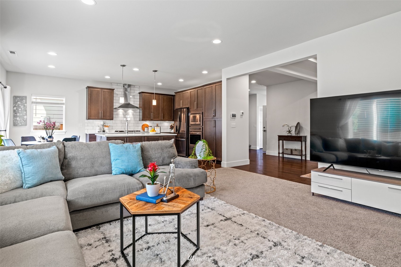 3720 194th Place Southeast Bothell, WA 98012 - Photo 12 of 36 a living room with furniture and a flat screen tv