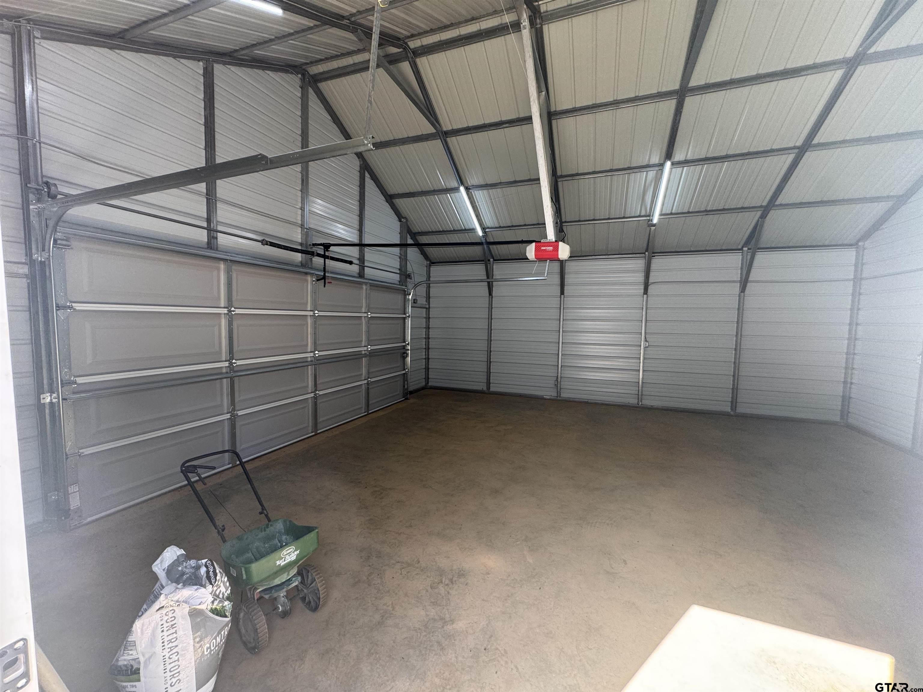 21070-c R 4147 C R 4147 Lindale, TX 75771 - Photo 21 of 23 a view of a room with racks on the wall