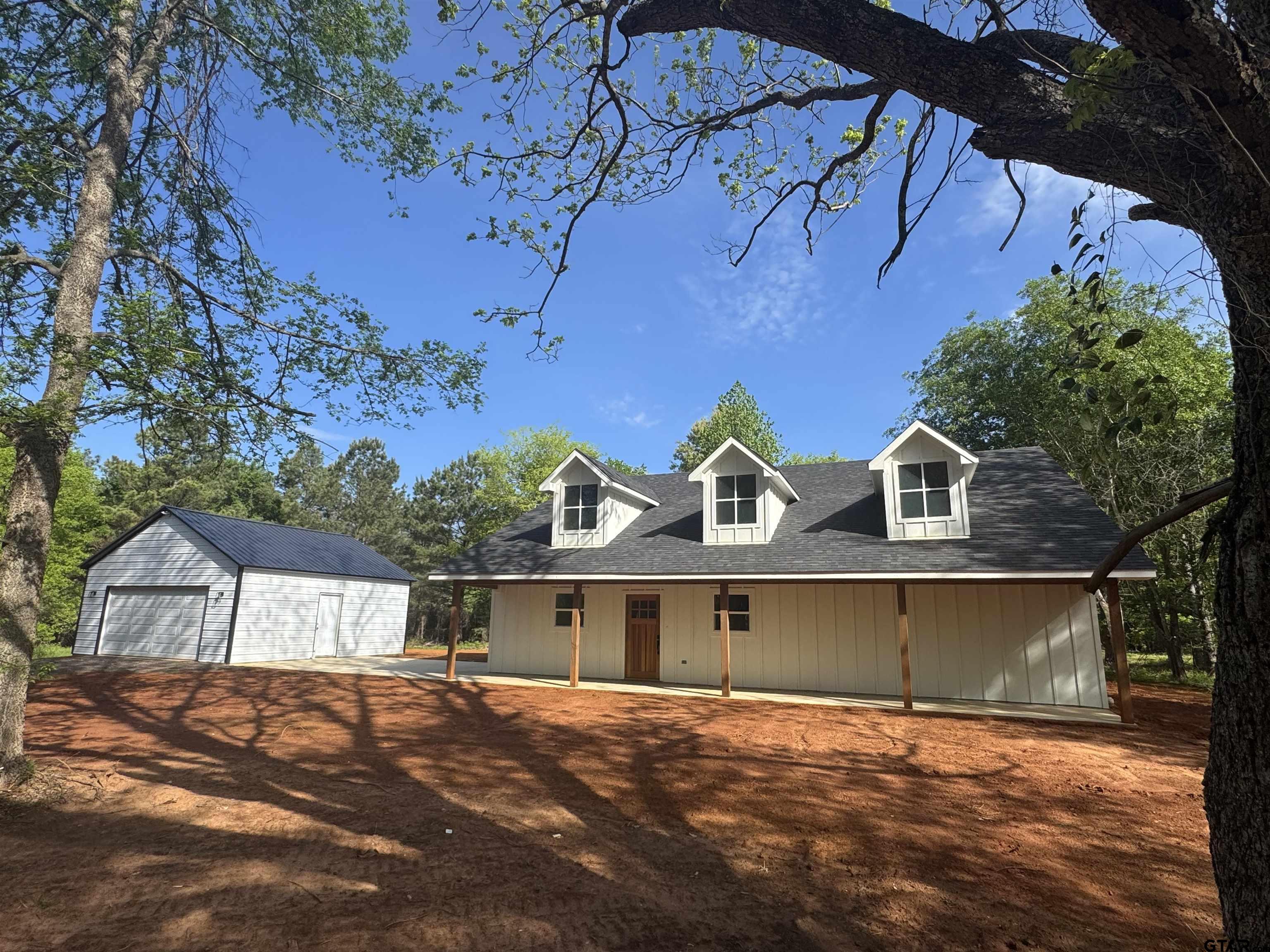 21070-c R 4147 C R 4147 Lindale, TX 75771 - Photo 3 of 23 a view of front of house with a yard