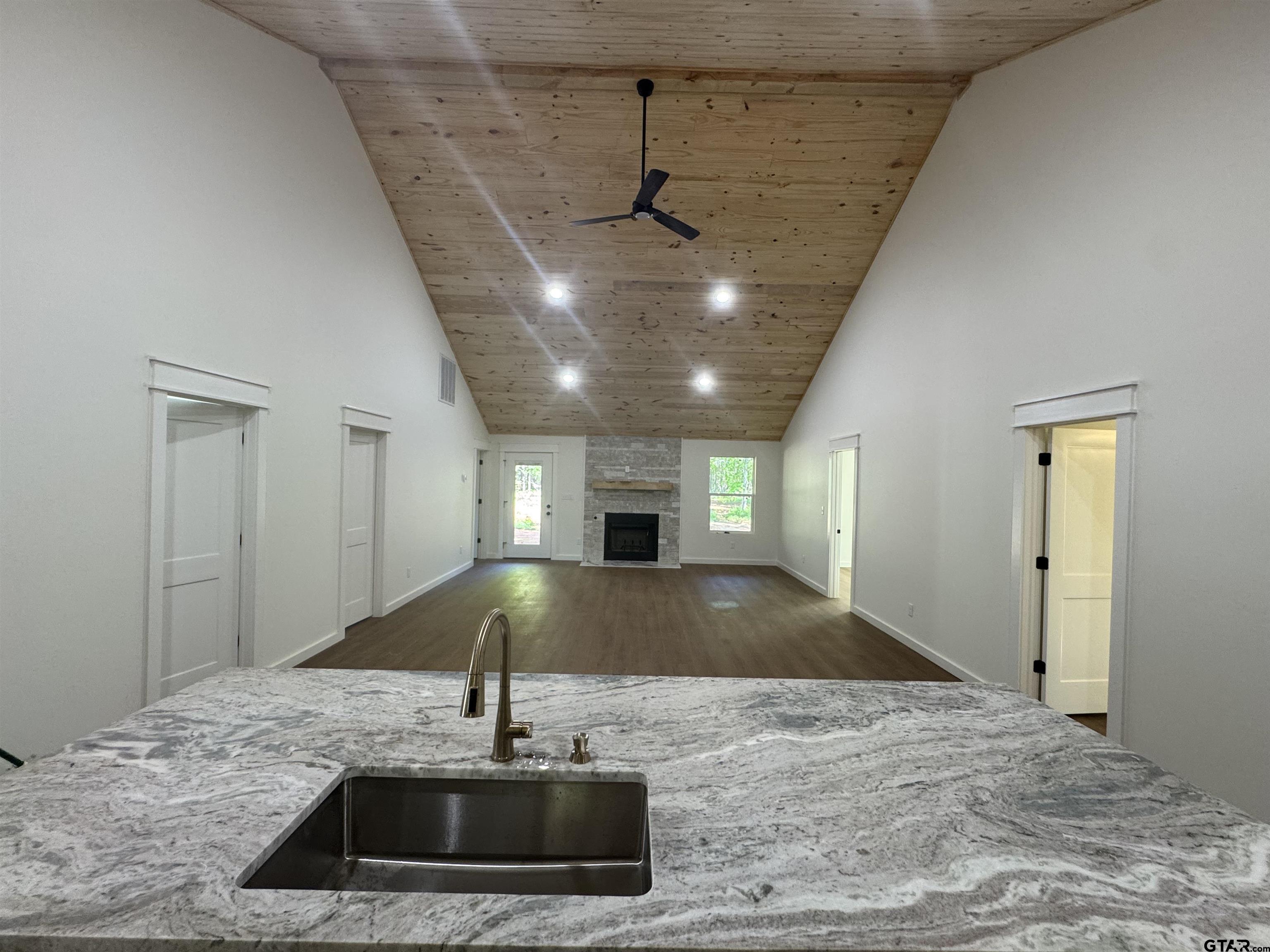 21070-c R 4147 C R 4147 Lindale, TX 75771 - Photo 7 of 23 a view of a room that has a chandelier