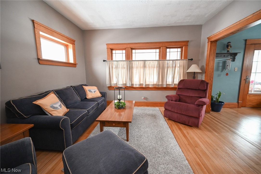4436 Ridge Road Brooklyn, OH 44144 - Photo 16 of 33 Living room with a wealth of natural light and light hardwood / wood-style flooring