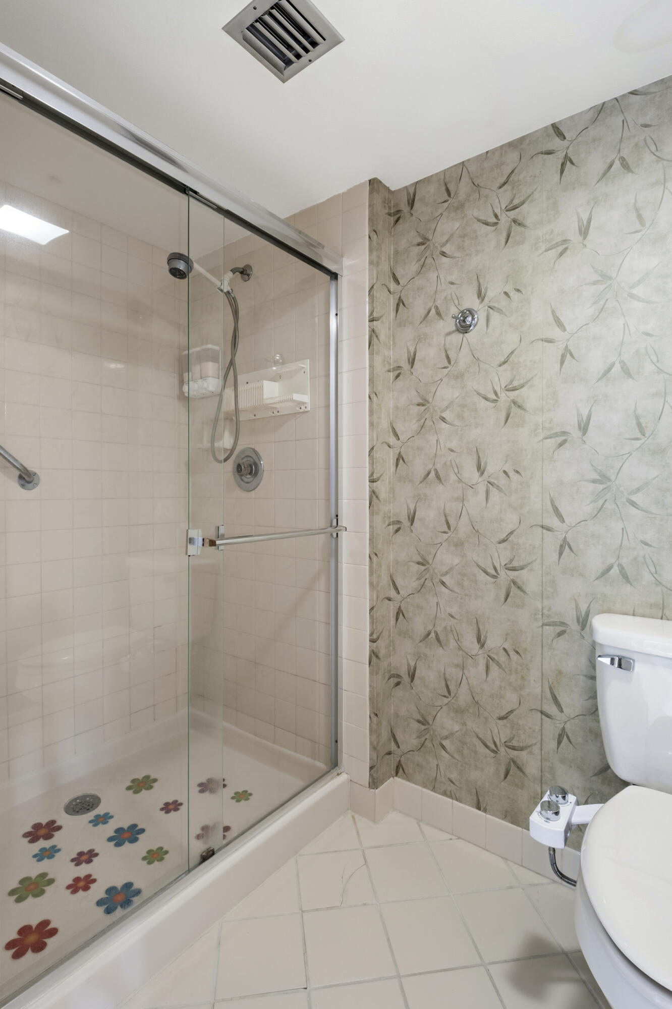 6145 Balboa Circle, Unit 103 Boca Raton, FL 33433 - Photo 14 of 31 a bathroom with a toilet and a shower
