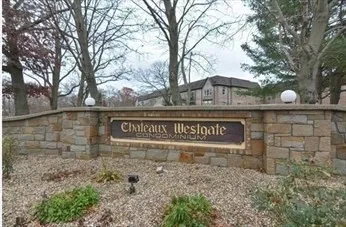 a sign broad on the side of the road