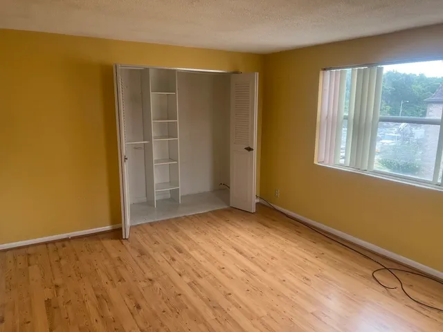 an empty room with windows