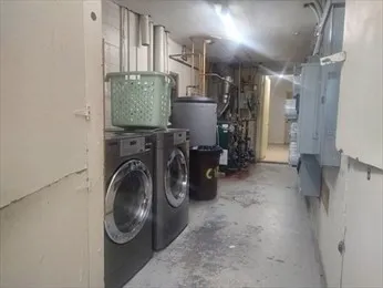 a utility room with cabinets