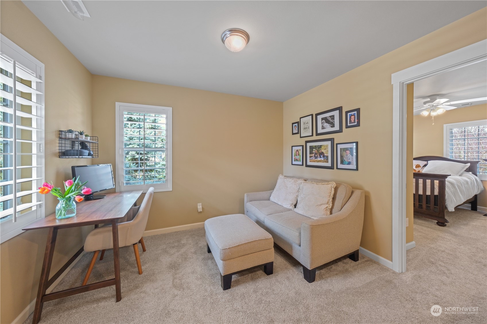 21907 37th Drive Southeast, Unit 30 Bothell, WA 98021 - Photo 16 of 27 a living room with furniture and a window