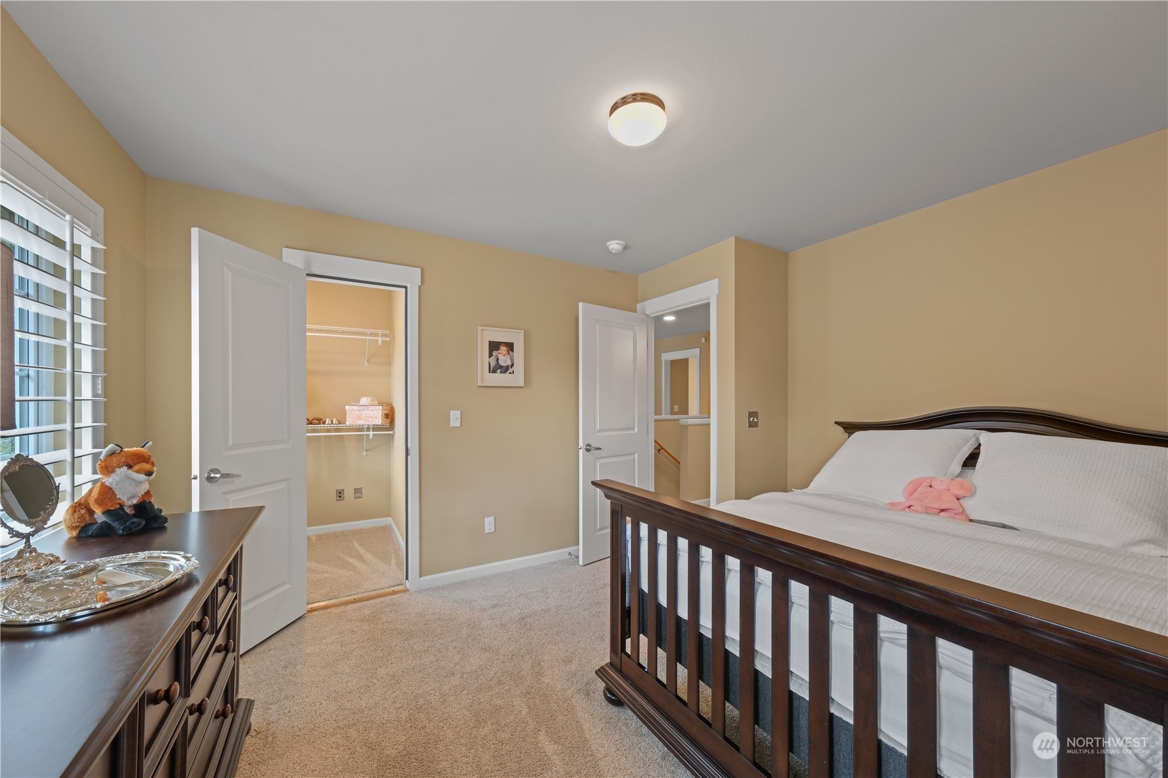 21907 37th Drive Southeast, Unit 30 Bothell, WA 98021 - Photo 18 of 27 a bedroom with furniture and a window