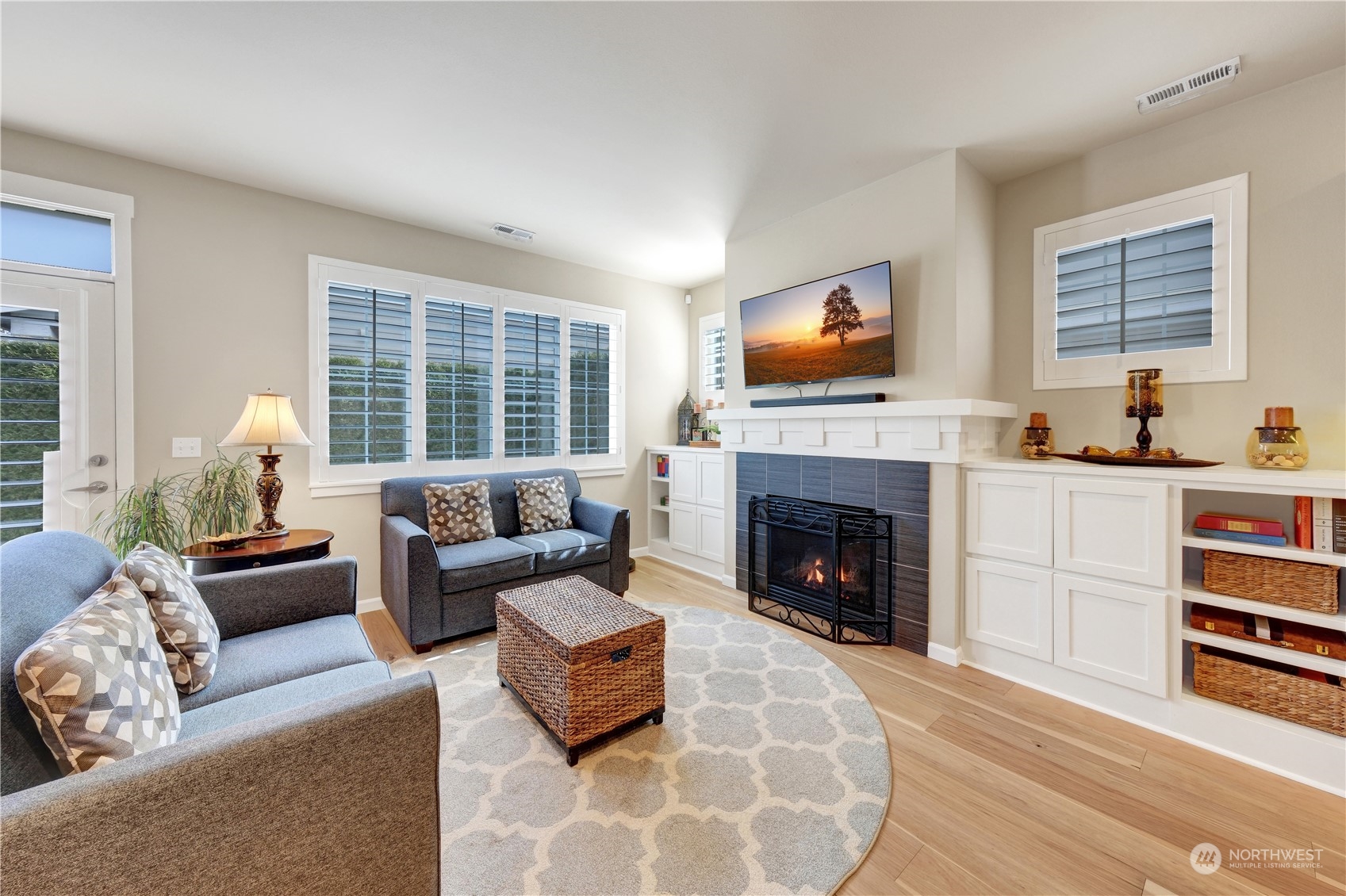 21907 37th Drive Southeast, Unit 30 Bothell, WA 98021 - Photo 10 of 27 a living room with furniture fireplace and window