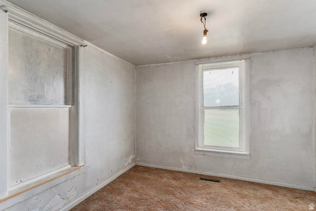 482 West 100 N Street Beaver, UT 84713 - Photo 16 of 41 Main/primary bedroom on 1st floor featuring carpet flooring and baseboards
