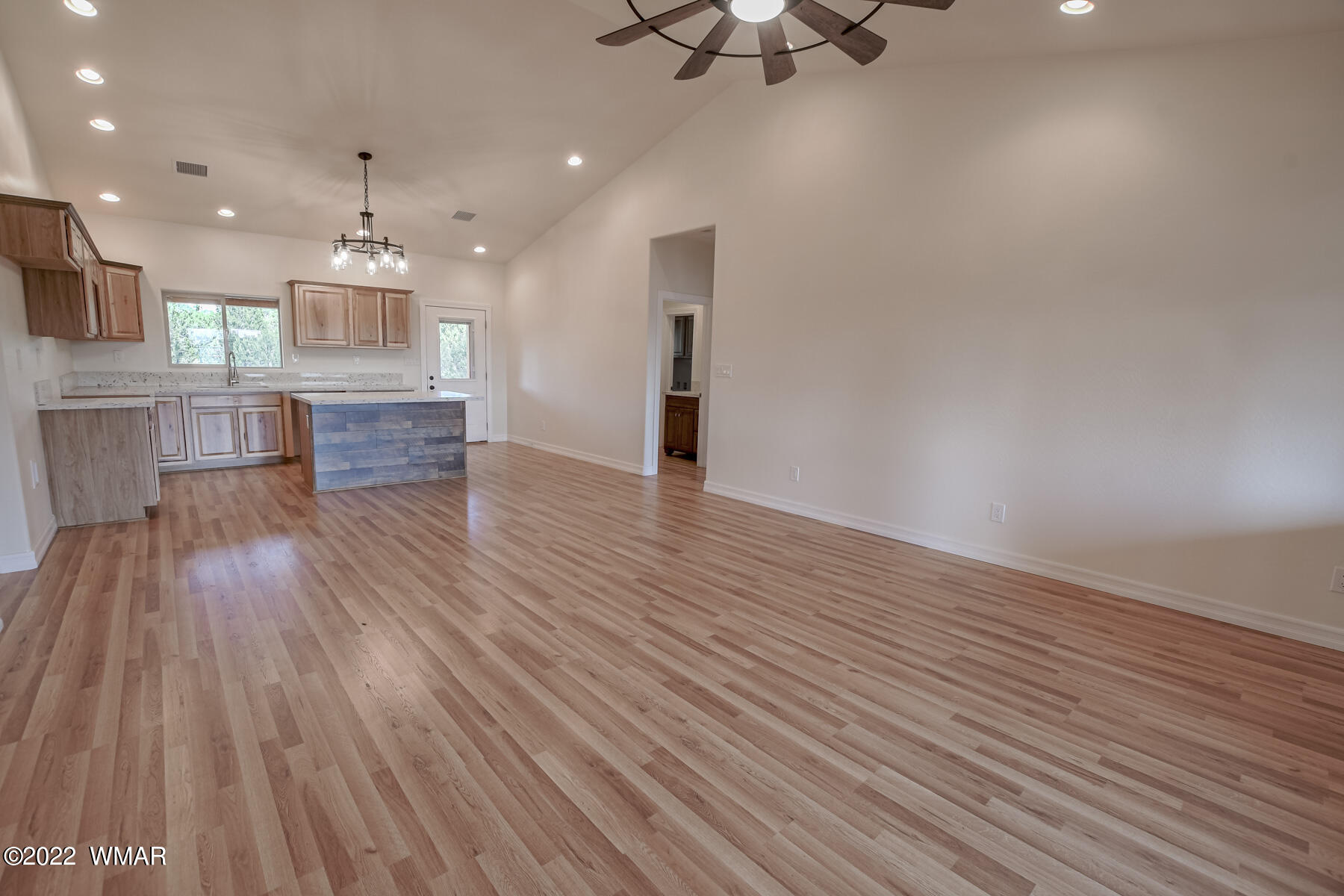 2956 Lodgepole Road Overgaard, AZ 85933 - Photo 17 of 34 a view of kitchen with cabinets and wooden floor