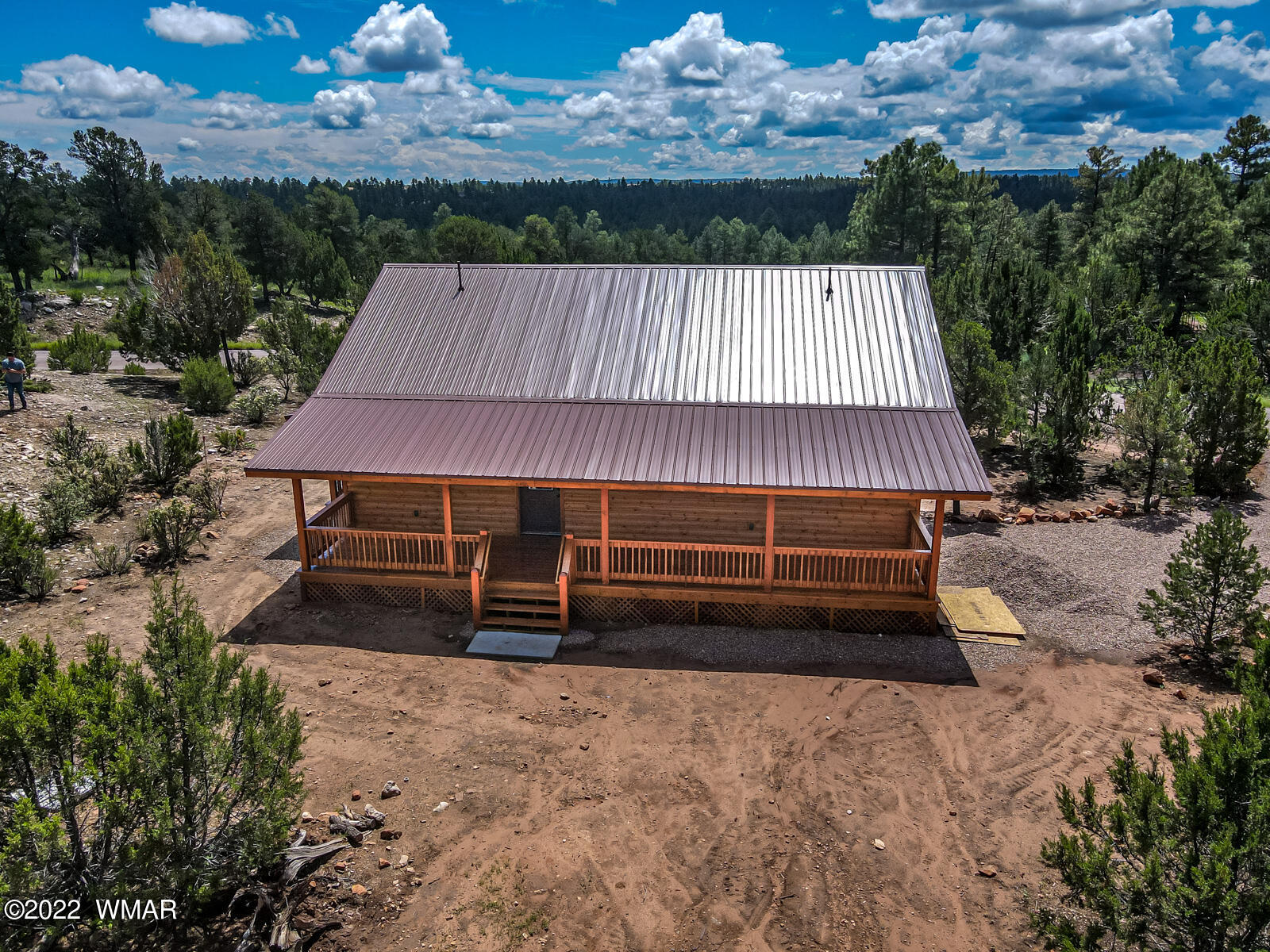 2956 Lodgepole Road Overgaard, AZ 85933 - Photo 3 of 34 a view of a house with a yard