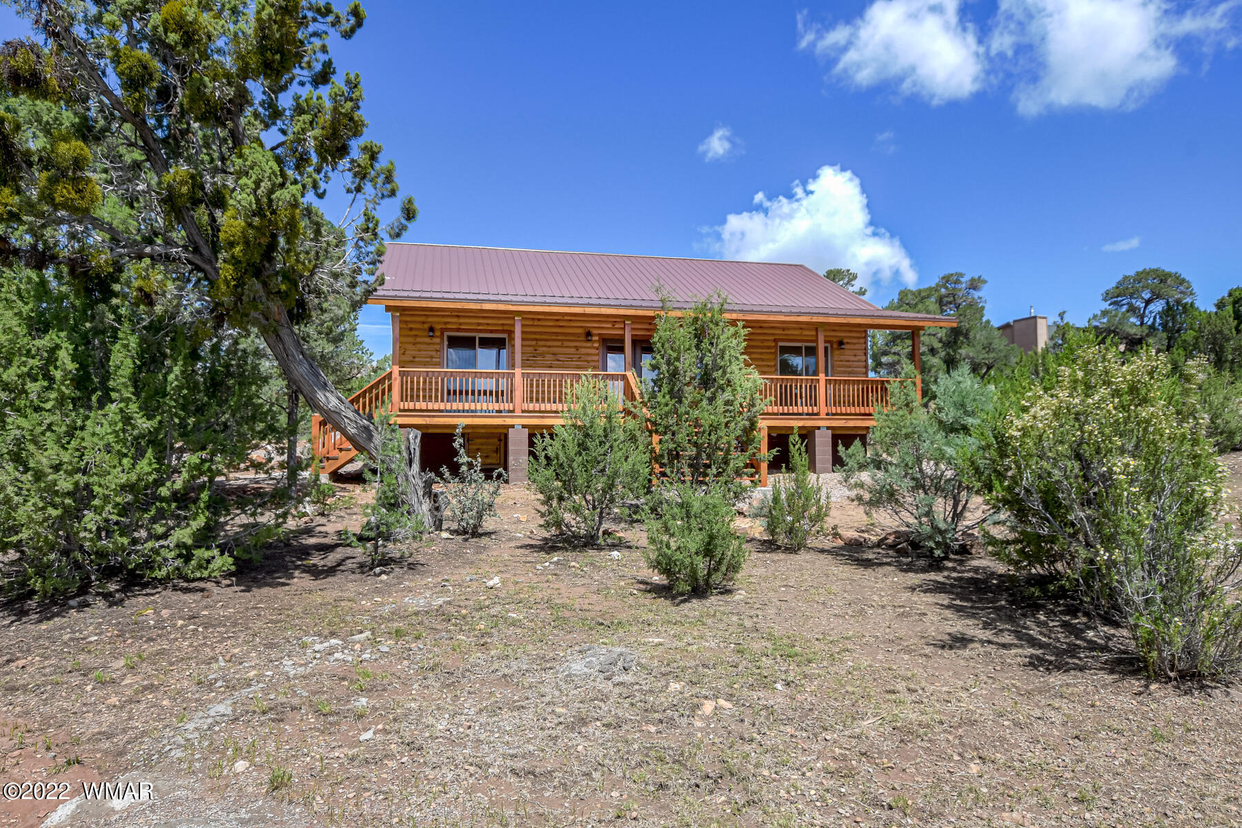 2956 Lodgepole Road Overgaard, AZ 85933 - Photo 4 of 34 a view of a house with a yard
