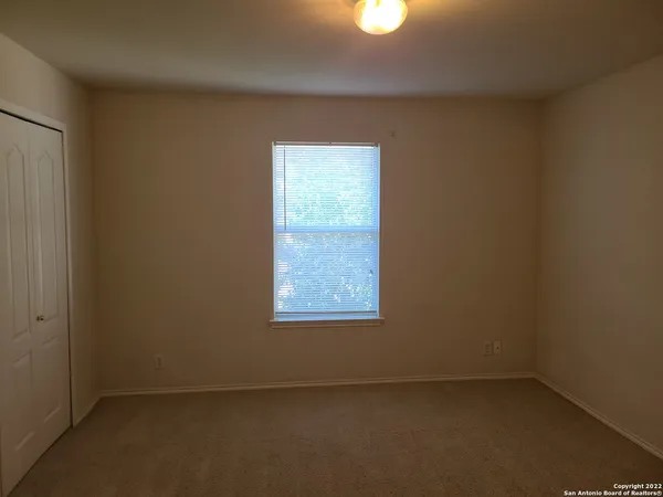 an empty room with closet