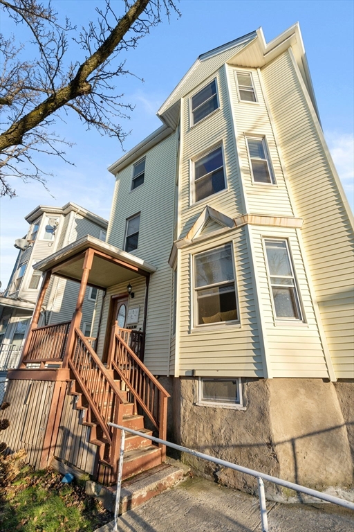 3266 Washington Street, Unit 3F Boston, MA 02130 - Photo 19 of 20 a front view of a house