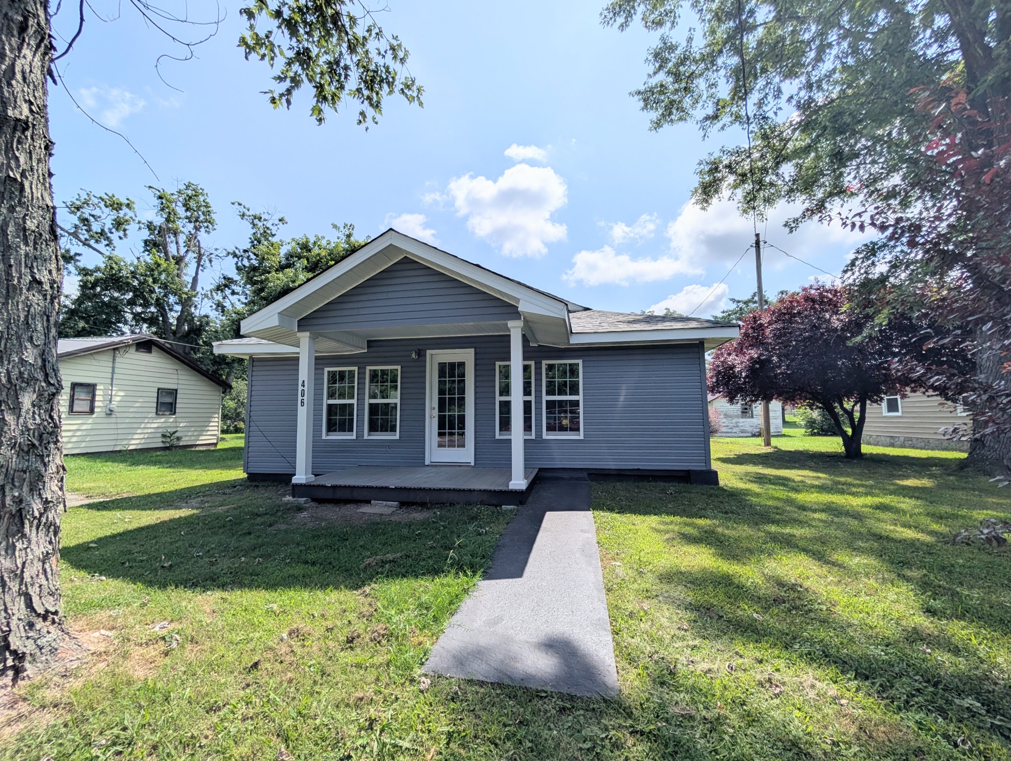 406 Horton Street Decherd, TN 37324 - Photo 1 of 24 a view of a yard in front of house