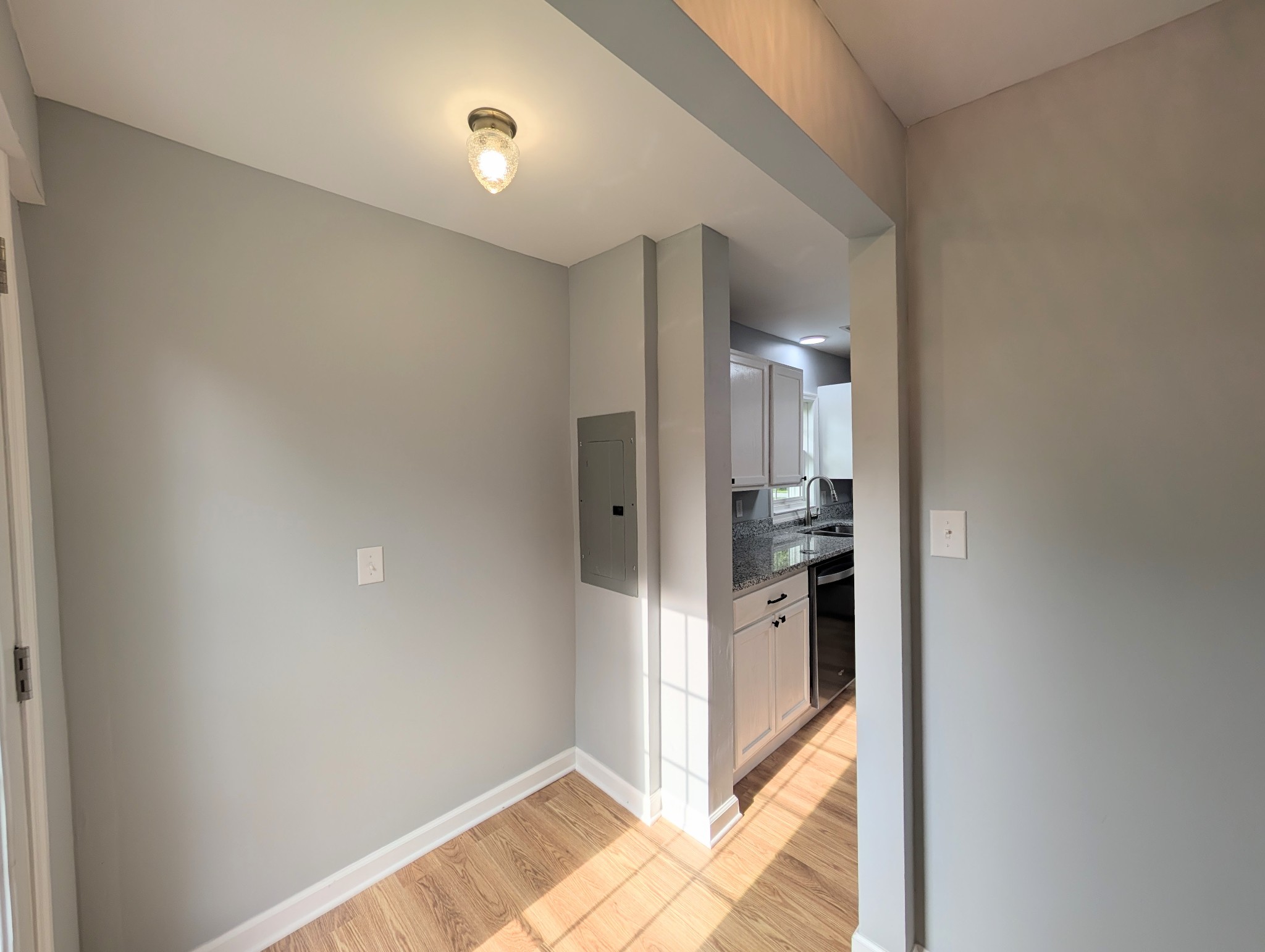 406 Horton Street Decherd, TN 37324 - Photo 22 of 24 a view of a kitchen from the hallway
