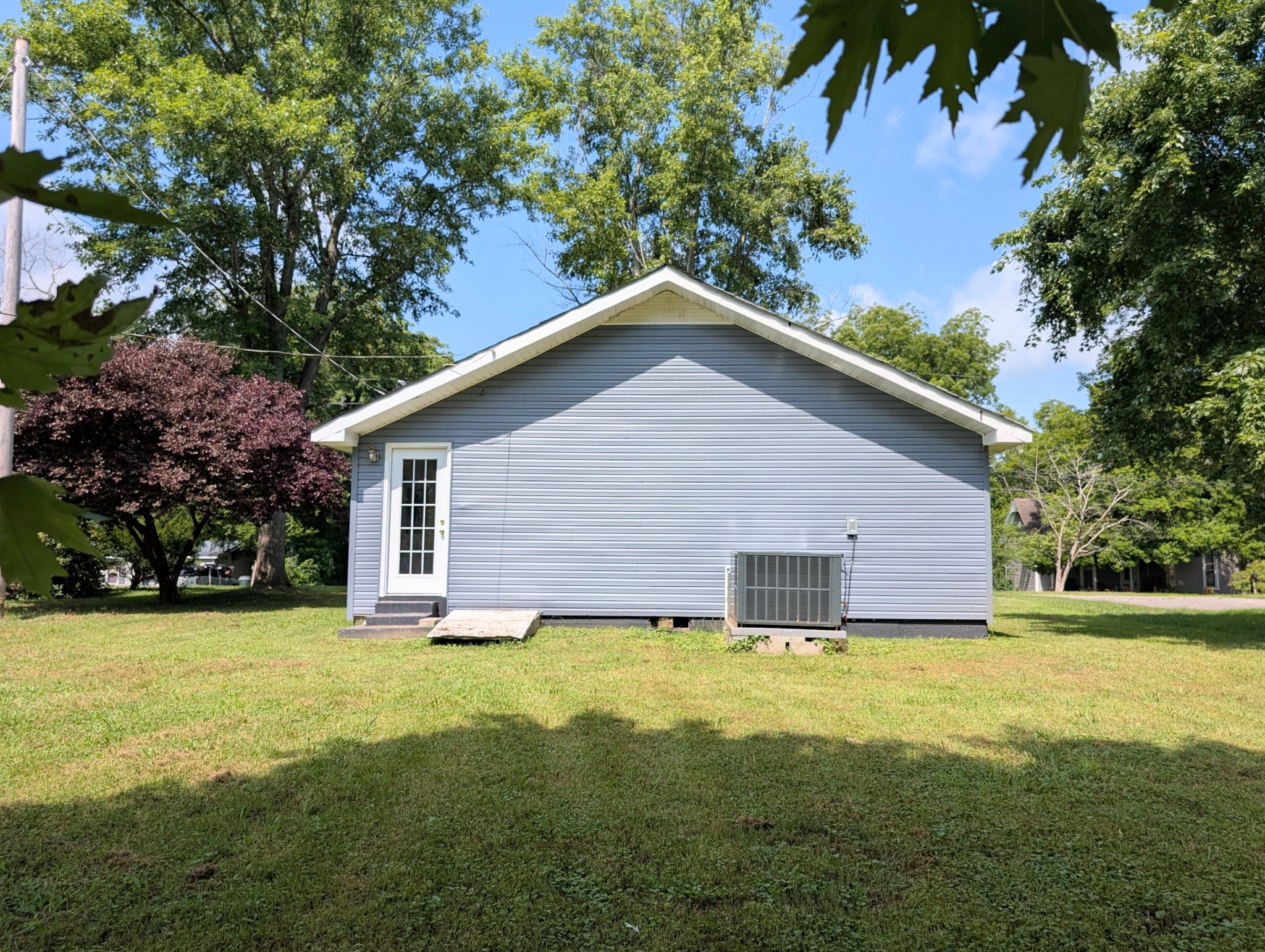 406 Horton Street Decherd, TN 37324 - Photo 7 of 24 a view of a house with a yard