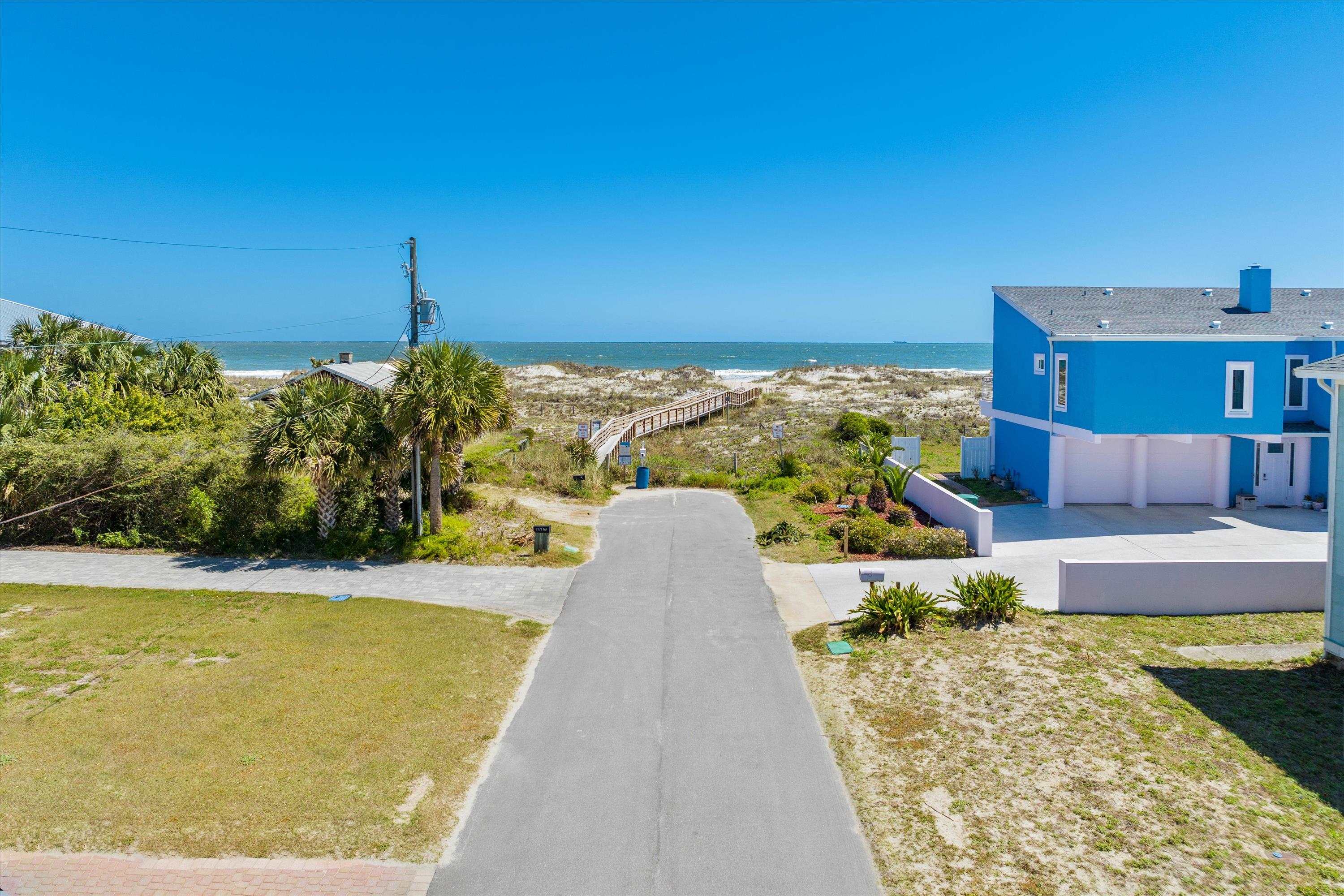 9 3rd Street St. Augustine, FL 32080 - Photo 1 of 25 a view of a swimming pool with a patio