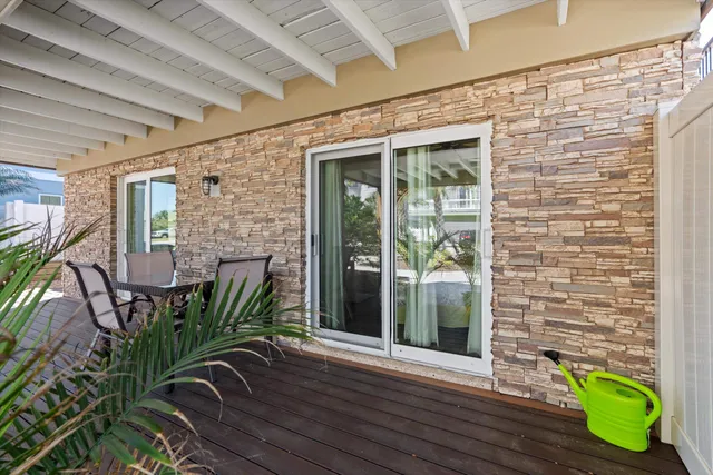 a potted plant sitting in front of a house