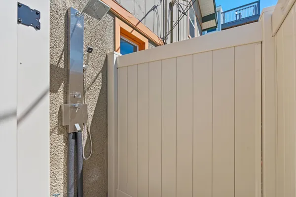 a view of a house with a door and stairs
