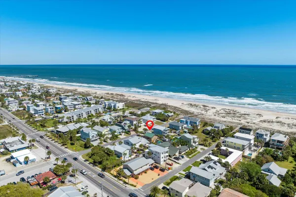 an aerial view of beach and ocean