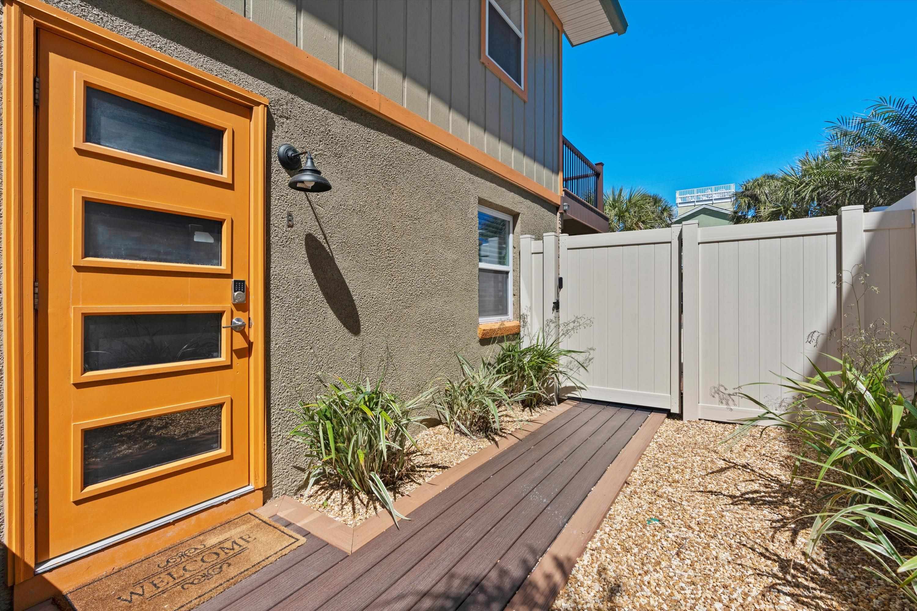 9 3rd Street St. Augustine, FL 32080 - Photo 4 of 25 a potted plant in front of a door