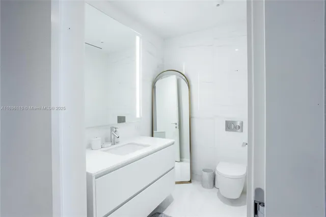 a bathroom with a sink and a toilet