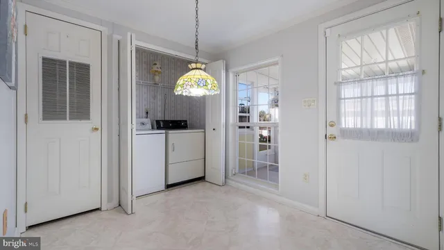 a view of empty room with a entryway
