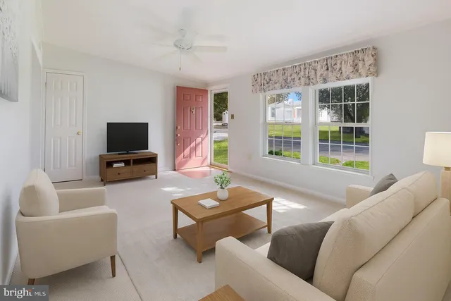 a view of a livingroom with a staircase