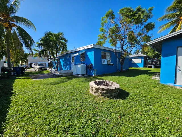 a view of swimming pool with outdoor seating
