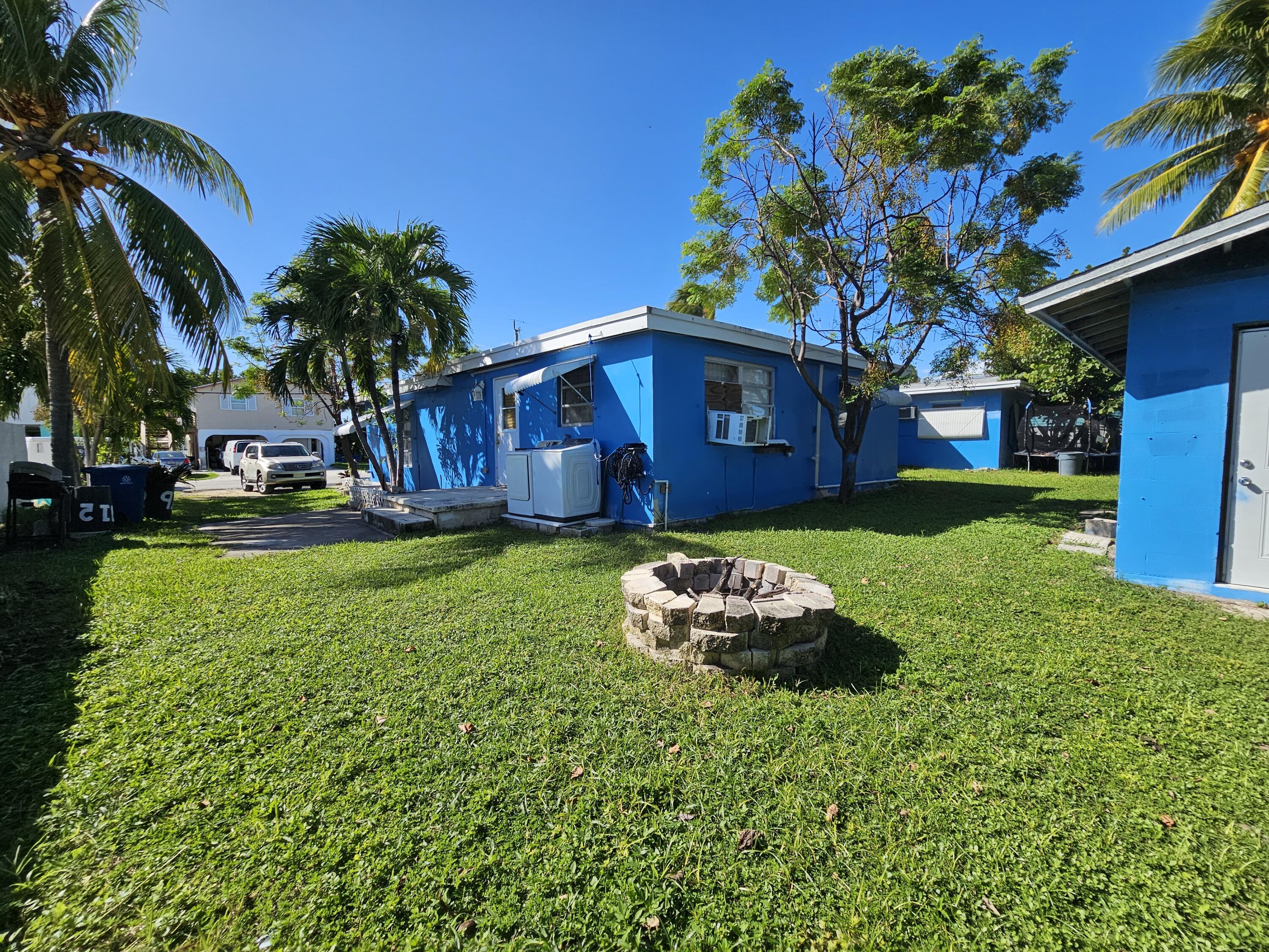 908 66th Street Marathon, FL 33050 - Photo 24 of 31 a front view of a house with a yard