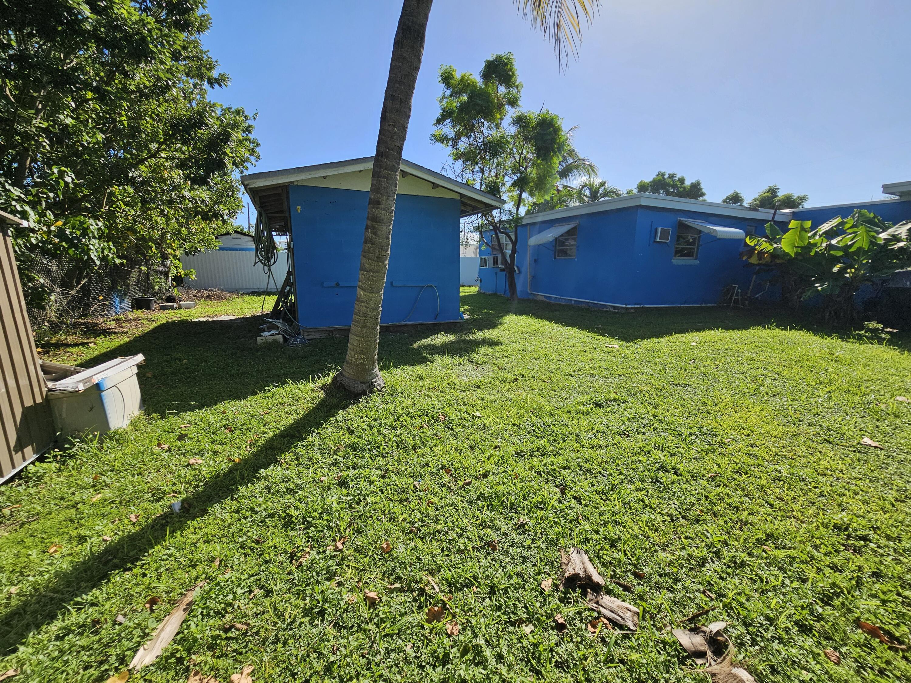 908 66th Street Marathon, FL 33050 - Photo 28 of 31 a view of a house with a yard